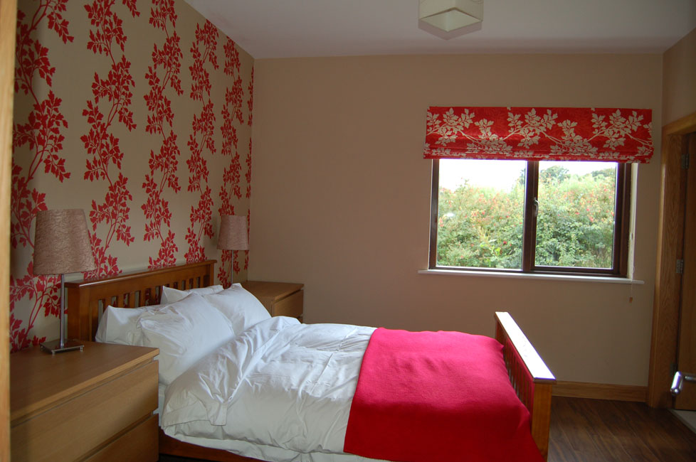 Red bedroom with ensuite